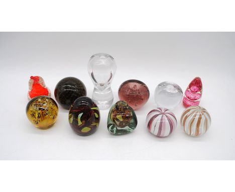A small collection of art glass paperweights, including Mdina, Murano, Dartington, Wedgwood, Odessa, Avondale et