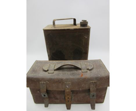 A vintage Esso petrol can along with a leather case