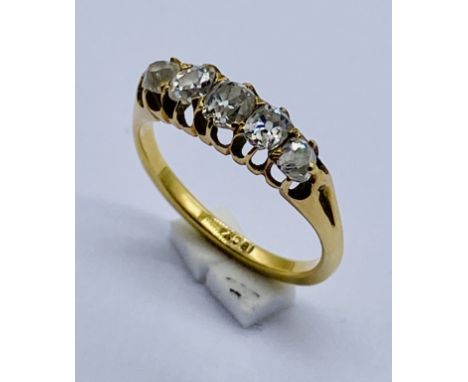 An 18ct gold diamond five stone ring