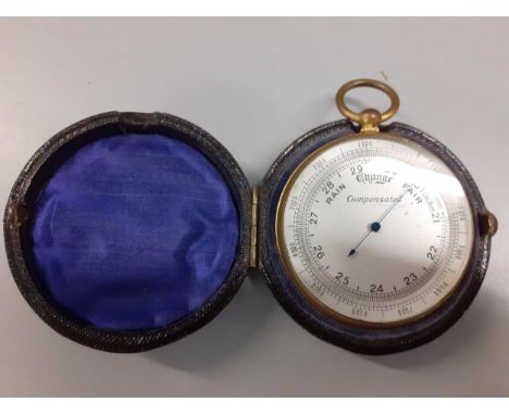 A compensated pocket barometer in a leather case. Location: Cab 