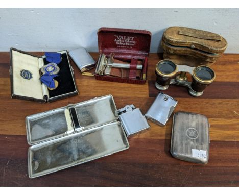 Collectables to include cigarette lighters, opera glasses, a silver Clapham Rotary club medallion, a razor, a silver cigarett
