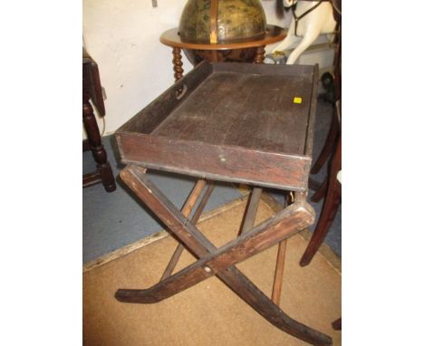 An Edwardian oak tray and cross framed stand, 70cm x 43cm, and a wheel hub lamp base A/F, 27cm hLocation: 