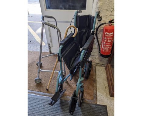 Medical equipment to include a wheelchair, a zimmer frame, and a walking stick 