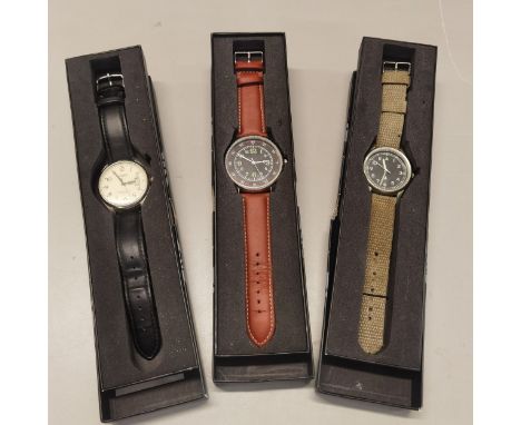 Three gents wristwatches to include a Timex perpetual calendar on a black leather strap and two othersLocation: port 