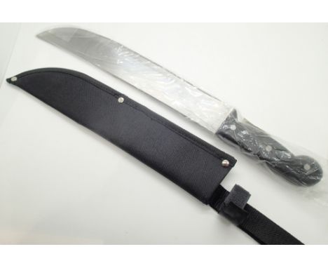 New steel machete in fabric sheath