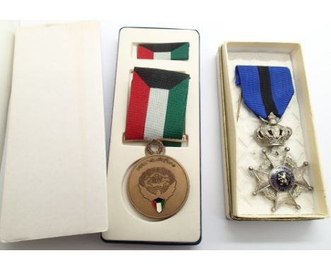 Boxed enamel Order of Leopold medal and a UN medal 