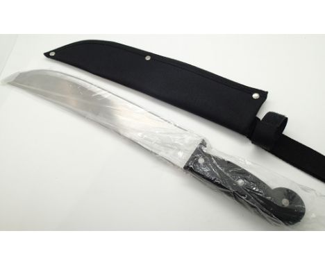 New steel machete in fabric sheath