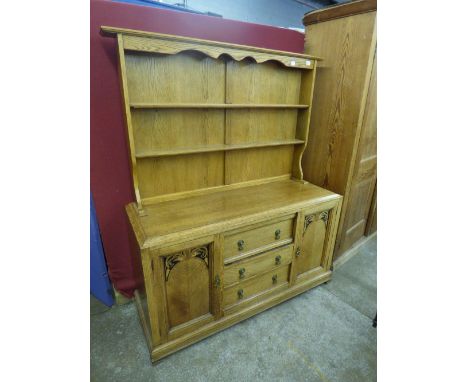 20TH CENTURY LIGHT OAK DRESSER WITH RACK HAVING INLAID PANEL DOORS138CMX166CM