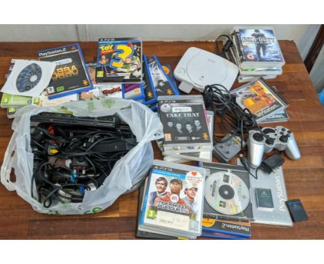 Gaming equipment to include Playstation 1,2 and 3 games, a Playstation 2 and Playstation One console, controllers, memory car