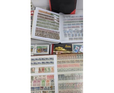 A quantity of postage stamps from around the world to include a Penny Red, Penny Black, an album o Australian examples, an al