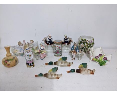 A group of Victorian and later ceramic ornaments to include a Chinese Canton famille rose brush pot A/F, a pair of Austrian c