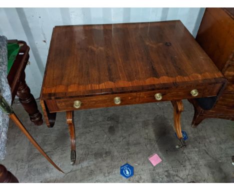 A Regency inlaid mahogany sofa table with twin drawers, on sabre legs and brass sabbotsLocation:If there is no condition repo