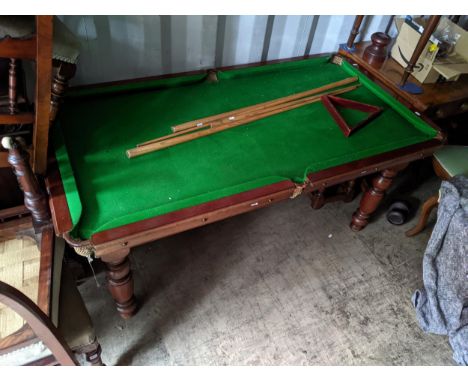 An early 20th century William Burgess, London mahogany snooker/billiards/dining tables on turned legs with three table top le