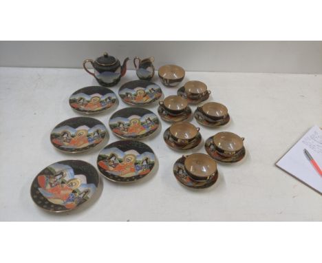 A 20th century Satsuma tea service to include a set of 6 cups, saucers, side plates, a teapot, milk jug and sugar bowlLocatio