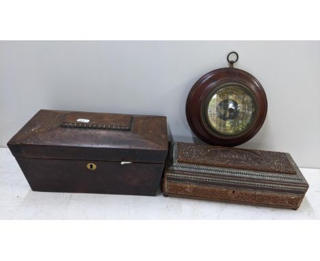 An early 19th century rosewood sarcophagus framed tea caddy, together with an Indian carved box and an aneroid barometerLocat