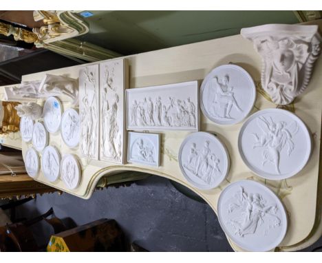 A collection of Royal Copenhagen and Bing and Grondahl bisque porcelain circular relief plaques, Victorian Parian ware wall b