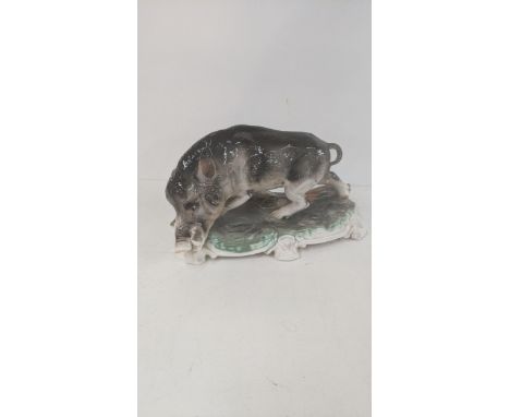 A ceramic sculpture of a boar on a plinth, 42cm w, 22.5cm hLocation:If there is no condition report shown, please request