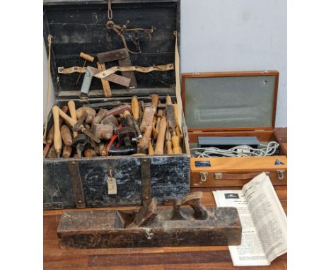 A collection of tools to include a vintage tool chest filled with files, chisels, set squares and others, along with a boxed 