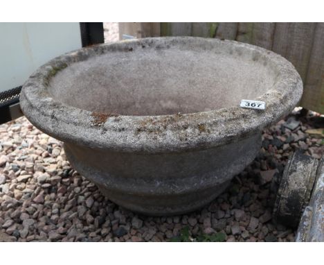 Large circular stone planter