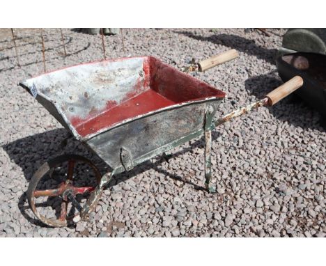 Vintage child's ornamental garden wheelbarrow / planter