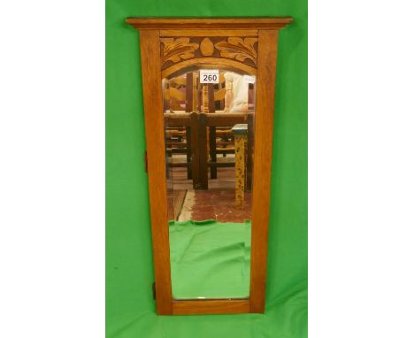 Oak framed bevelled glass mirror