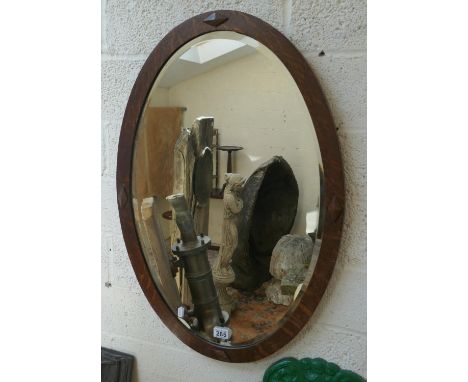 Oak framed bevelled glass mirror