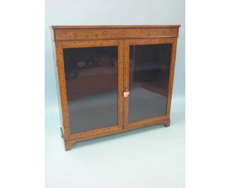 A late Victorian satinwood and floral marquetry cabinet, pair of glazed doors enclosing lined interior with two fitted shelve