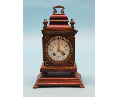 A late 19th century French tortoiseshell mantel clock, bell-striking movement, brass mounted case with paste-set bezel, on or