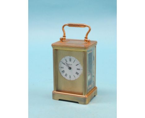 An Angelus brass carriage clock, with bell-striking movement, 7.25in. 