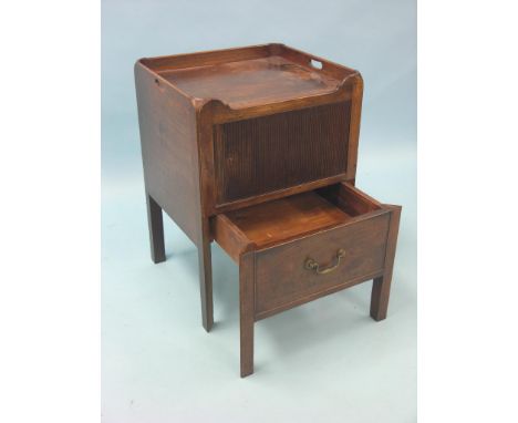 A George III mahogany tray-top commode, recess enclosed by sliding tambour shutter, single drawer beneath with brass swan-nec