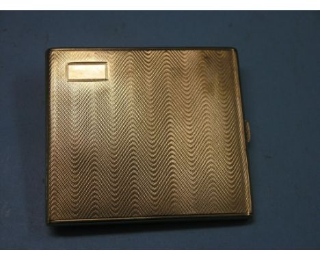 An engine-turned 9ct. gold cigarette case, Birmingham 1928, 111.8 grams; personalised inscription