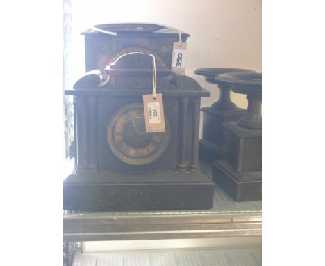 A Victorian black slate mantel clock, architectural-style with French gong-striking movement, with pendulum, 11.5in. wide and