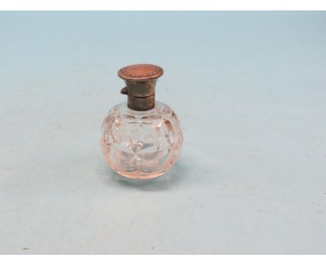 A cut glass scent bottle, with engraved, hinged silver cover, Sheffield 1923, 4.5in. - stopper lacking 