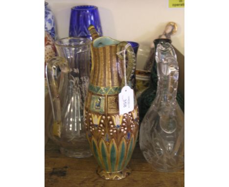 A majolica jug, moulded in Egyptian-style, 11.5in. - chips, and three other ceramic items, also to include three coloured gla