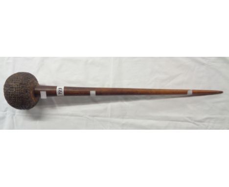 An old African knobkerrie with tapered wooden shaft and bulbous head with applied woven hide finish