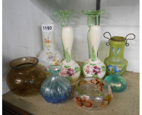 A selection of assorted coloured glassware including green enamel decorated vase, etc.