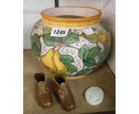 A 20th Century Italian maiolica jardiniere with typical hand painted frieze depicting fruits and foliage - sold with a pair o