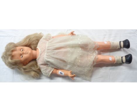 A large vintage talking doll