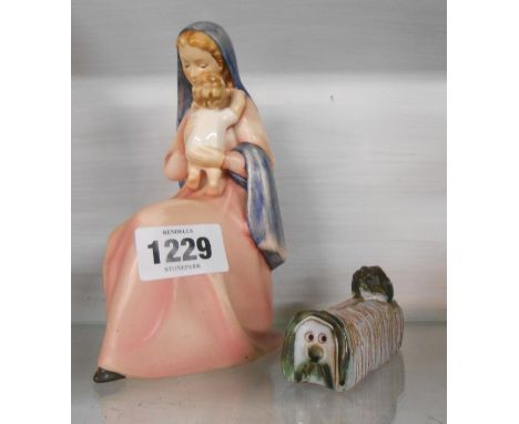 A Goebel figurine depicting The Madonna and Child - sold with a small studio pottery figurine depicting Dougal the dog from T