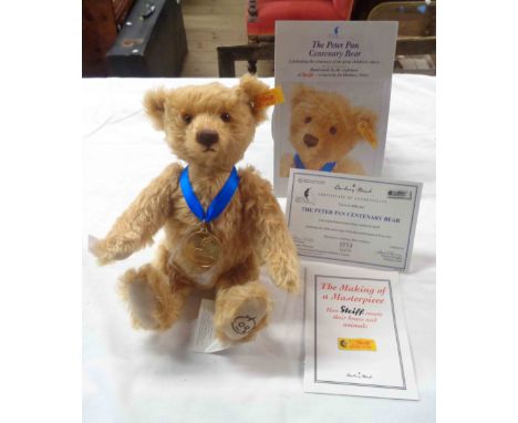 A vintage Steiff limited edition bear made to celebrate 100 years of Peter Pan with original ear button, tags, medal and cert