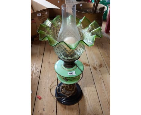 A Victorian oil lamp with painted green opaque reservoir, chimney and shade (a/f) - converted to electricity