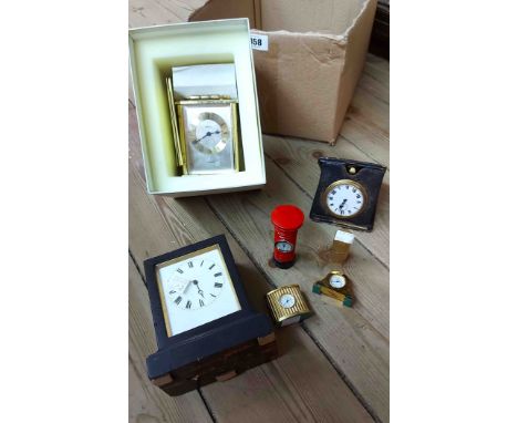 An antique small French ebonised wood cased carriage timepiece and a vintage travelling timepiece - sold with a selection of 