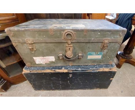 An 84cm old black painted pine military transit trunk a/f - sold with a vintage travelling trunk with shipping labels