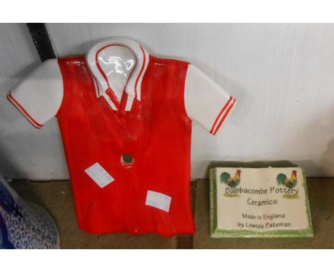 A vintage Babbacombe Pottery wall mask, in the form of a football shirt in the 1996-98 Arsenal home colours - sold with a Low