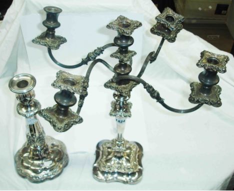 A large silver plated candlestick with associated damaged four branch five light plug-in top - sold with another large candle