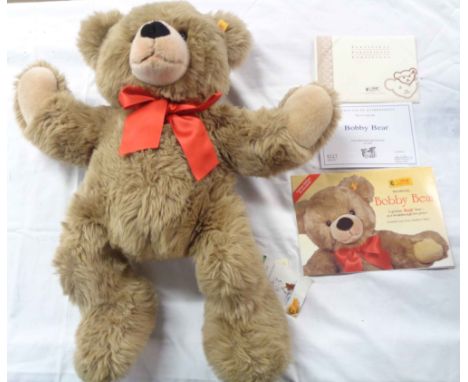 A vintage Steiff Teddy bear from the Cosy Friends range 'Bobby' with original ear button, tags and certificate