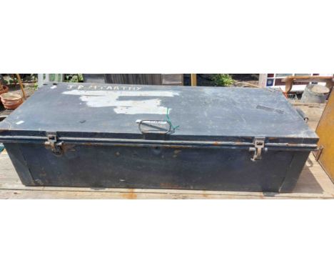 A vintage military transit trunk marked for J.P. McCarthy