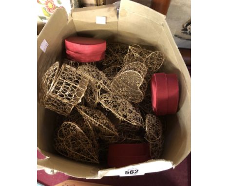 A box containing a quantity of modern wirework heart shaped trinket boxes and hanging decorations, etc.