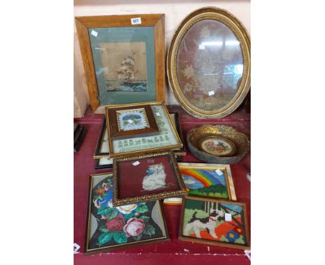 An embroidered panel depicting a Naval ship in full sail, set in wooden frame - sold with ten antique and later framed and gl