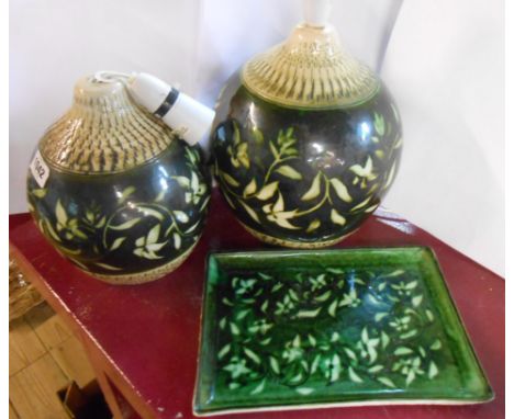 A large Bristow (Chillington) studio pottery lamp with wax resist and incised decoration on a green lustre ground - sold with